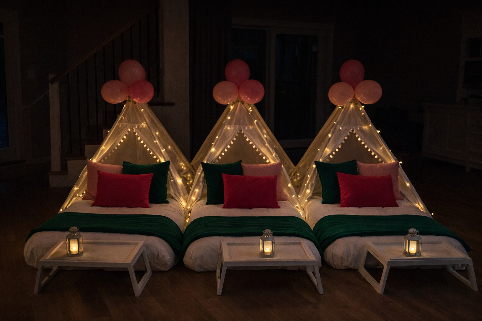 Three glowing teepee sleepover party setups at night with pink balloons and fairy lights — Baltimore County MD