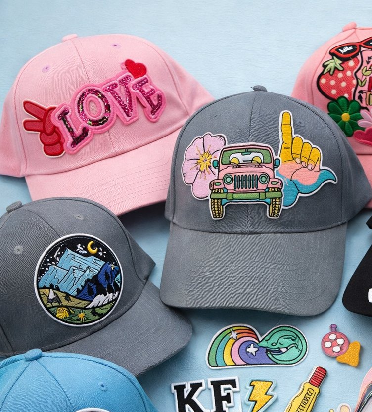 Three custom hats with fun patches in a flatlay — party box hat decorating activity — Baltimore County MD