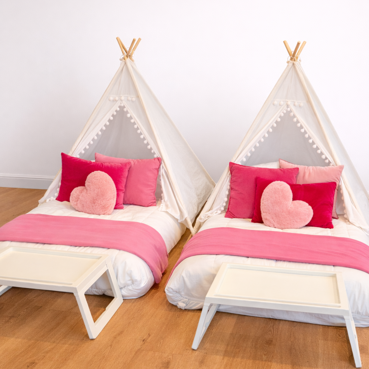 Luxe teepee sleepover party rental with pink accent pillows and serving tray — Baltimore County MD