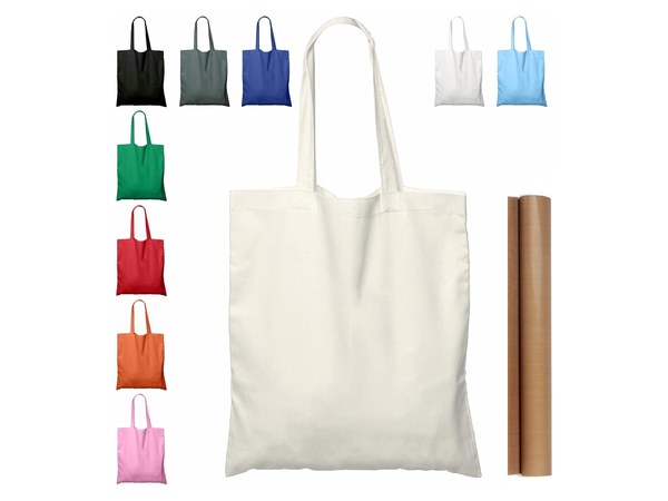 Stack of plain natural cotton tote bags for decorating