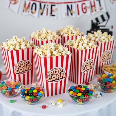 Colorful popcorn boxes in pajama party theme