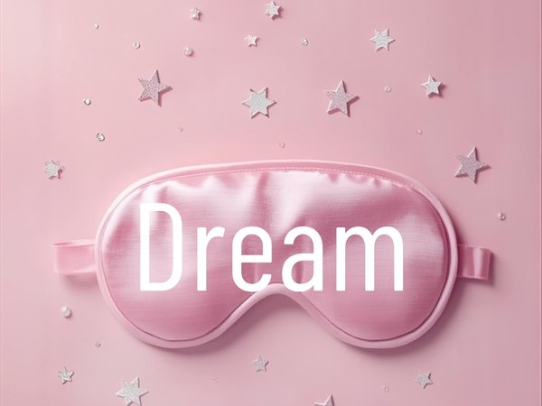 Pink satin sleep eye mask flat lay