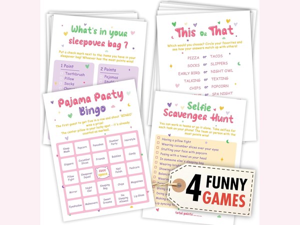 Slumber party bingo cards laid out with pink markers on a pastel background