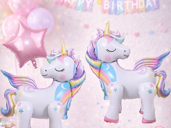 Unicorn standing balloon decorations for a birthday or sleepover party