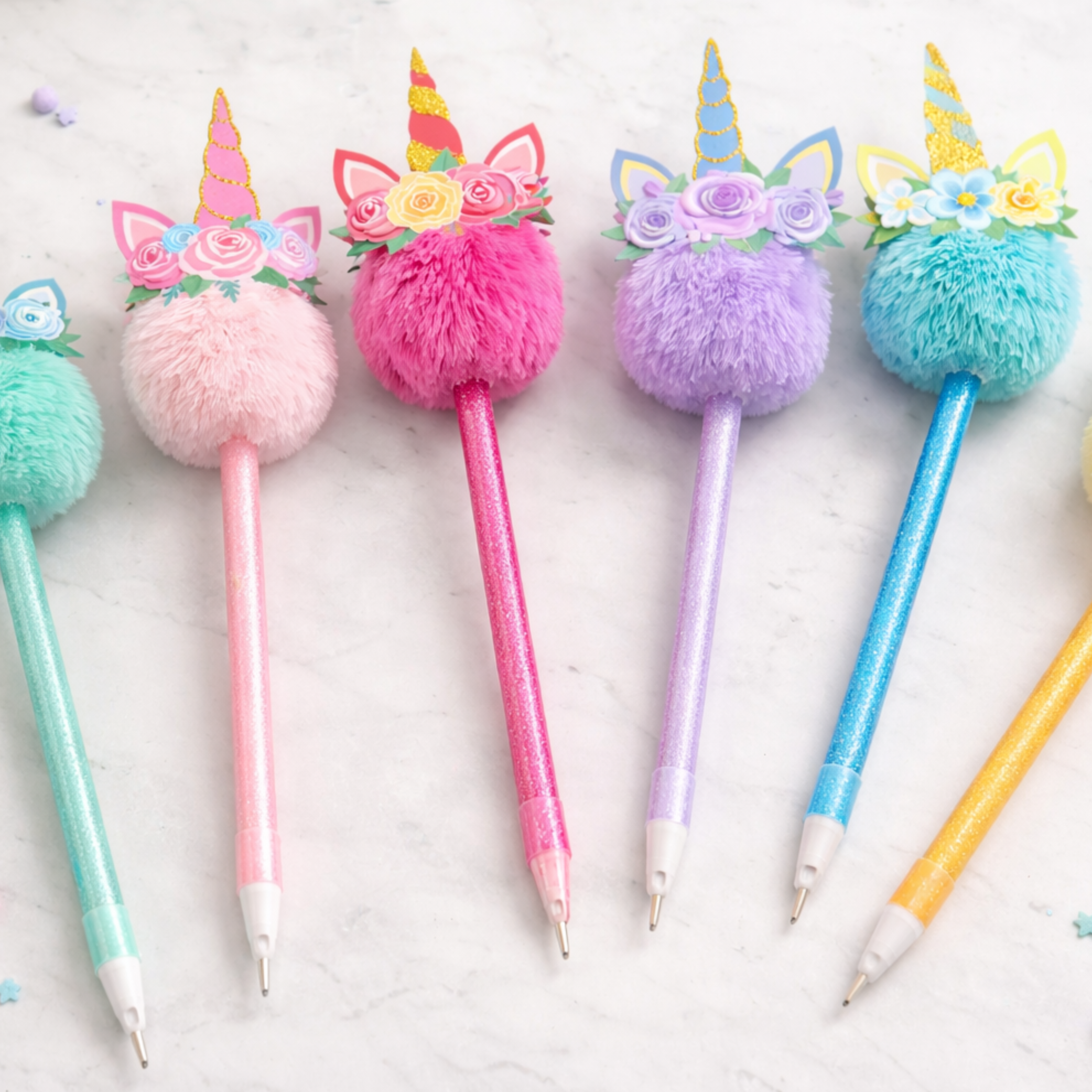 Set of colorful unicorn ballpoint pens with pastel ink and glitter detail