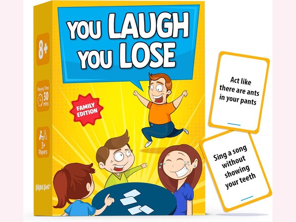 You Laugh You Lose card game deck with playful charades cards on a pink background