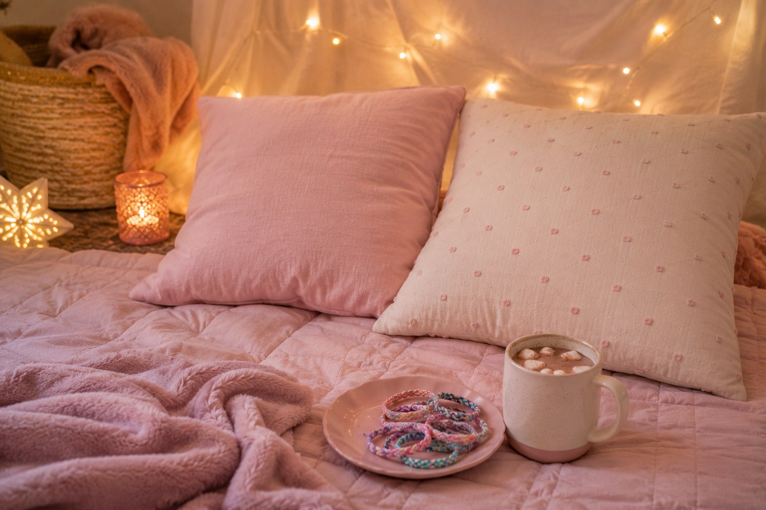 A quiet girl settling into a cozy sleepover setup with a soft plush and a calm craft